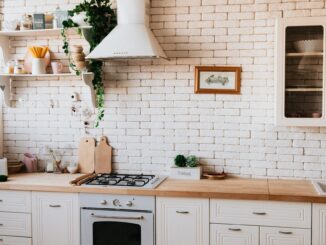 chopping boards near oven under hood - Top Five Interior Design Trends for 2021