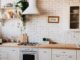 chopping boards near oven under hood - Top Five Interior Design Trends for 2021