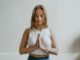 woman doing yoga inside a room - KEEP FIT WHEN YOU'RE INDOORS