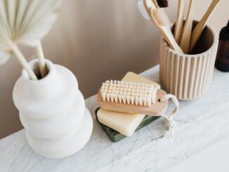 set of natural toiletries on marble tabletop