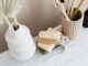 set of natural toiletries on marble tabletop