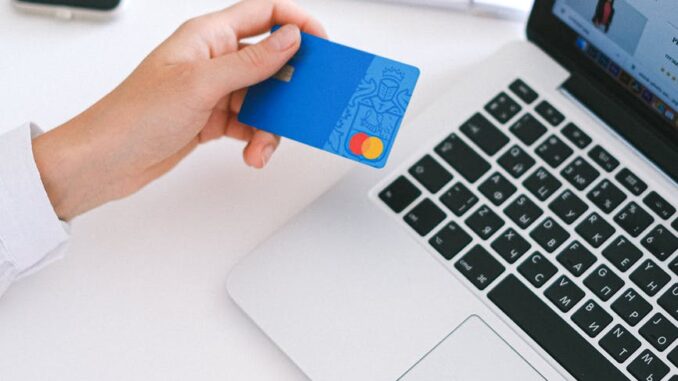 What have our spending habits been like after the last year? - person holding bank card