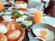 fried egg beside bread platter