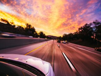 cars ahead on road - Changing travel trends: save this summer staycation with top car maintenance hacks