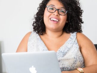 photography of woman using laptop - how to stay cool when working from home