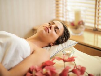 30 Wedding Beauty Trends Predictions for Winter 2021 and Spring 2022 - woman in wrapped in white towel lying on bed with eyes closed