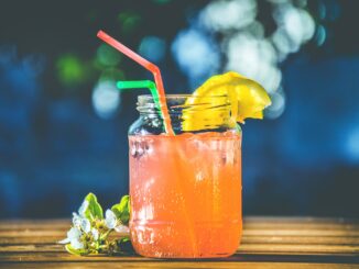 pink liquid on glass - Most Popular Mocktails To Try At Home