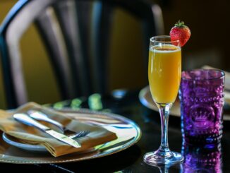 mimosa drink on a champagne glass