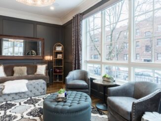 round tufted gray ottoman