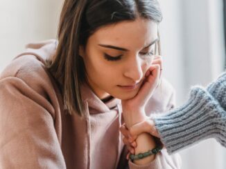 sad woman with anonymous female