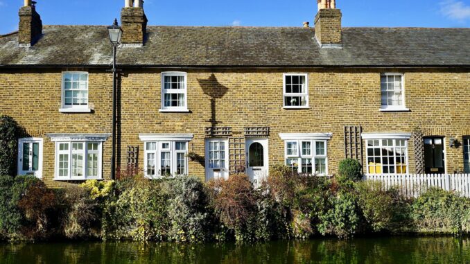 yellow and white bricked house